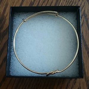 A gold bracelet by Noumanda